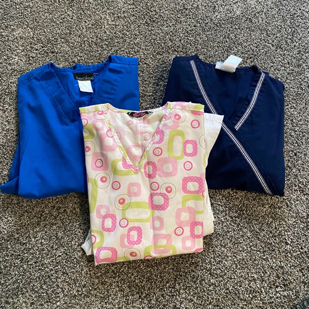 3 pairs of nursing scrubs